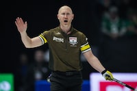 Team Manitoba-Carruthers skip Brad Jacobs calls out to the sweepers while playing Team Canada during the playoffs at the Brier, in Regina, Friday, March 8, 2024. THE CANADIAN PRESS/Darryl Dyck