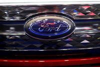 FILE PHOTO: A Ford logo is pictured at the Canadian International Auto Show in Toronto, Ontario, Canada February 15, 2024. REUTERS/Cole Burston/File Photo