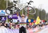 Dutch Mathieu van der Poel of Alpecin-Deceuninck celebrates after winning the men's race of the 'Ronde van Vlaanderen' (Tour des Flandres) one day cycling race, 270,8 km from Antwerp to Oudenaarde, on March 31, 2024. (Photo by LAURIE DIEFFEMBACQ / Belga / AFP) / Belgium OUT (Photo by LAURIE DIEFFEMBACQ/Belga/AFP via Getty Images)