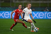 Norway's midfielder #18 Frida Maanum (R) and Switzerland's midfielder #13 Lia Walti (L) fight for the ball during the Australia and New Zealand 2023 Women's World Cup Group A football match between Switzerland and Norway at Waikato Stadium in Hamilton on July 25, 2023. (Photo by Saeed KHAN / AFP) (Photo by SAEED KHAN/AFP via Getty Images)