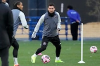 Inter Miami's Lionel Messi warms up with his teammates during a training session Tuesday, Feb. 6, 2024, in Chiba, near Tokyo. Inter Miami is facing Vissel Kobe in a friendly soccer match Wednesday. (AP Photo/Eugene Hoshiko)