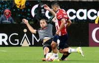 Guadalajara's Gael Garcia (R) fights for the ball with Forge's Terran Campbell during the CONCACAF Champions League soccer match between Mexico's Guadalajara and Canada's Forge FC at Akron Stadium in Guadalajara, Jalisco state, Mexico, on February 13, 2024. (Photo by ULISES RUIZ / AFP) (Photo by ULISES RUIZ/AFP via Getty Images)