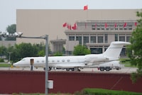 A handout image shows a private jet of Tesla CEO Elon Musk at the airport in Beijing, China, April 28, 2024. Courtesy of Chang Yan/Handout via REUTERS  THIS IMAGE HAS BEEN SUPPLIED BY A THIRD PARTY. MANDATORY CREDIT. NO RESALES. NO ARCHIVES