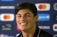 FILE - Wales' Louis Rees-Zammit smiles during a news conference in Toulon, France, Thursday, Oct. 12, 2023. Wales rugby international Louis Rees-Zammit, one of the world's most exciting wingers, is quitting the sport to pursue his dream of playing the NFL. (AP Photo/Pavel Golovkin, File)