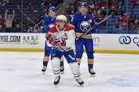 Montreal Canadiens right wing Brendan Gallagher (11) reacts after a goal by defensemen Justin Barron during the first period of an NHL hockey game against the Buffalo Sabres in Buffalo, N.Y., Monday, Oct. 23, 2023. (AP Photo/Adrian Kraus)