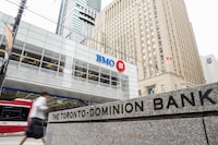 TD Bank and Bank of Montreal signage is pictured in the financial district in Toronto, Friday, Sept. 8.