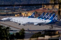 FILE PHOTO: Alaska Airlines commercial airplanes are shown parked off to the side of the airport in San Diego, California, Calinforia, U.S. January 18, 2024, as the the National Transportation Safety Board continues its investigation of the Boeing 737 MAX 9 aircraft.  REUTERS/Mike Blake/File Photo