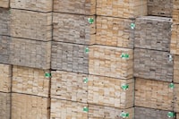 Softwood lumber is pictured in Richmond, B.C., Tuesday, April 25, 2017. British Columbia forestry company Canfor says it is "restructuring" its operations in the province, permanently closing one sawmill and shuttering another for an extended period amid plans to build a new wood manufacturing facility. THE CANADIAN PRESS/Jonathan Hayward
