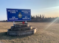 A sign for Canadian Forces Base Goose Bay is shown in Happy Valley-Goose Bay, N.L. in a May 11, 2023 photo. A town in Labrador has declared a state of emergency because a fire has spread to an area containing explosive material. THE CANADIAN PRESS/Sarah Smellie