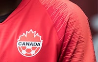 A Canada soccer logo is seen on Alphonso Davies in Vancouver on March 24, 2019. Canada, bidding to add much-needed FIFA ranking points, will play Iceland in a men's international soccer friendly on Jan. 15. THE CANADIAN PRESS/Darryl Dyck