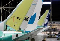 FILE PHOTO: The tail of Boeing's new 737 MAX-9 is pictured next to an older model under construction at their production facility in Renton, Washington, U.S., February 13, 2017. Picture taken February 13, 2017. REUTERS/Jason Redmond/File Photo