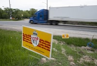 Signs against the proposed Highway 413, placed on Dan O’Reilly’s property in Bolton, Ont., are photographed on May 18, 2022. Fred Lum/The Globe and Mail. 