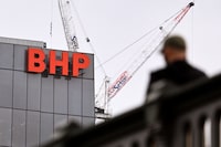 The company logo adorns the side of the BHP gobal headquarters in Melbourne on February 21, 2023. - The Australian multinational, a leading producer of metallurgical coal, iron ore, nickel, copper and potash, said net profit slumped 32 percent year-on-year to 6.46 billion US dollars in the six months to December 31. (Photo by William WEST / AFP) (Photo by WILLIAM WEST/AFP via Getty Images)