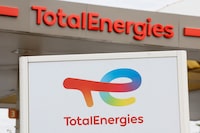 FILE PHOTO: TotalEnergies logos are seen at a fuel station in Nice, France, October 10, 2022. REUTERS/Eric Gaillard