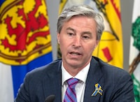 Nova Scotia Premier Tim Houston fields a question at a meeting in Halifax on Monday, March 21, 2022. Houston says there won’t be specific assistance for customers who prepaid for furnace oil to Maritime Fuels, which filed for bankruptcy last week.THE CANADIAN PRESS/Andrew Vaughan
