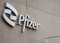 FILE PHOTO: A  compagny logo is seen at a Pfizer office in Puurs, Belgium, December 2, 2022. REUTERS/Johanna Geron/File Photo