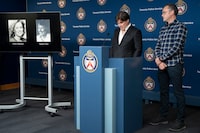 Sean McCowan speaks as Kaelin McCowan looks on, brothers of Erin Gilmour, during a press conference in Toronto on Monday November 28, 2022. Toronto police say they've arrested a 61-year-old man in the DNA-linked cold-case murders of Gilmour and Susan Tice, who were found dead in their homes within months of each other almost four decades ago. THE CANADIAN PRESS/Chris Young