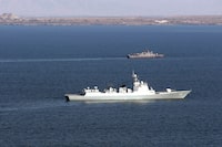 This handout picture provided by the Iranian Defence Ministry on March 12, 2024 shows the Chinese People's Liberation Army Navy (PLAN) destroyer Urumqi (118) at sea during the "Maritime Security Belt 2024" combined naval exercise between Iran, Russia, and China in the Gulf of Oman. The military activities -- to be conducted from March 11 through 15 -- are aimed at "jointly maintaining regional maritime security", according to a statement published on social media platform WeChat by China's defence ministry. The joint exercises coincide with soaring tensions in the region as the war in Gaza rages and Iran-backed Huthi rebels in Yemen have launched a flurry of attacks on ships in the Red Sea. (Photo by Iranian Army office / AFP) / RESTRICTED TO EDITORIAL USE - MANDATORY CREDIT "AFP PHOTO / IRANIAN DEFENCE MINISTRY" - NO MARKETING NO ADVERTISING CAMPAIGNS - DISTRIBUTED AS A SERVICE TO CLIENTS (Photo by -/Iranian Army office/AFP via Getty Images)