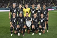 New Zealand players pose for a group photo before the Women's World Cup soccer match between New Zealand and Norway in Auckland, New Zealand, Thursday, July 20, 2023. (AP Photo/Andrew Cornaga)