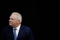 Ontario Premier Doug Ford says the province is opening up funding for housing-enabling infrastructure to more municipalities. Ford looks on during an announcement, in Toronto, Wednesday, Jan. 17, 2024.  THE CANADIAN PRESS/Cole Burston