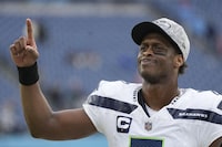 Seattle Seahawks quarterback Geno Smith celebrates after the Seahawks defeated the Tennessee Titans in an NFL football game on Sunday, Dec. 24, 2023, in Nashville, Tenn. (AP Photo/George Walker IV)