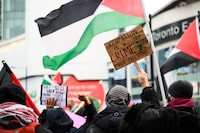 Demonstrators shout slogans in protest of Israel's continued attacks on the Gaza Strip, in downtown Toronto, Saturday, Dec. 23, 2023. THE CANADIAN PRESS/Christopher Katsarov