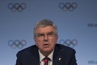 International Olympic Committee (IOC) President Thomas Bach speaks at a press conference after the second day of the 141st IOC session in Mumbai, India, Monday, Oct. 16, 2023. (AP Photo/Rafiq Maqbool)