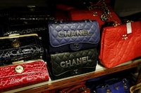 FILE PHOTO: Counterfeit handbags are displayed at the Customs headquarters in Hong Kong, China, August 6, 2015.  REUTERS/Bobby Yip/File Photo