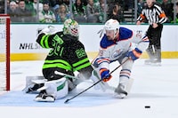 Apr 3, 2024; Dallas, Texas, USA; Dallas Stars goaltender Jake Oettinger (29) stops a breakaway shot by Edmonton Oilers center Sam Carrick (39) during the first period at the American Airlines Center. Mandatory Credit: Jerome Miron-USA TODAY Sports