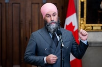 NDP Leader Jagmeet Singh speaks to reporters on Parliament Hill in Ottawa on Tuesday, Nov. 21, 2023. Singh is ruling out the possibility of forming a coalition government with the Liberals if no party wins a clear majority after the next federal election. THE CANADIAN PRESS/Spencer Colby