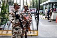 Indo-Tibetan Border Police stand guard outside the office building where Indian tax authorities raided BBC's office in New Delhi on February 15, 2023, following a protest against the BBC by  Hindu Sena activists, an Indian right-wing organization. - Indian tax department raids at BBC offices entered a second day on February 15, journalists at the broadcaster told AFP, in an action rights groups linked to critical coverage of Prime Minister Narendra Modi. (Photo by Sajjad HUSSAIN / AFP) (Photo by SAJJAD HUSSAIN/AFP via Getty Images)