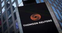The Thomson Reuters logo is seen on the company building in Times Square, New York. The news and information company reported a higher quarterly net profit on Feb. 9, 2017.