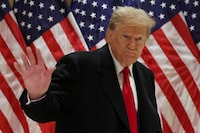 Republican presidential candidate and former U.S. President Donald Trump gestures at a press conference at one of his properties after attending a hearing in his criminal court case on charges stemming from hush money paid to a porn star in New York City, U.S., March 25, 2024