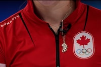 The Canadian Olympic Committee has become the first national Olympic committee in the world to join the Centre for Sport and Human Rights. Canada's Kaitlyn Lawes wears an Olympic Rings necklace during a women's curling match against the Russian Olympic Committee at the Beijing Winter Olympics, Monday, Feb. 14, 2022. THE CANADIAN PRESS/AP-Brynn Anderson