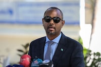 Somalia's Defense Minister Abdulkadir Mohamed Nur speaks at a press conference in Mogadishu on December 21, 2022 after the arrival of the first group of Somali soldiers trained in Eritrea. (Photo by Hassan Ali Elmi / AFP) (Photo by HASSAN ALI ELMI/AFP via Getty Images)