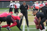 San Francisco 49ers defensive coordinator Steve Wilks, center, watch as players practice at the team's NFL football training facility in Santa Clara, Calif., Thursday, Feb. 1, 2024. The 49ers will face the Kansas City Chiefs in Super Bowl 58. (AP Photo/Tony Avelar)