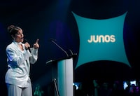 Nelly Furtado, Canadian singer and songwriter, speaks on stage during the Juno Awards nominees announcement in Toronto on Tuesday, February 6, 2024. THE CANADIAN PRESS/Nathan Denette