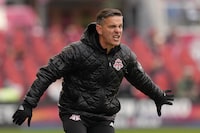 Toronto FC's Head Coach John Herdman stands on the touchline MLS action in Toronto against Charlotte FC, on Saturday March 9, 2024.THE CANADIAN PRESS/Chris Young