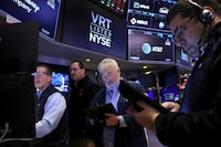 Traders work on the floor at the New York Stock Exchange (NYSE) on Nov. 17.