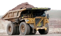 A haul truck carries a full load at a mine operation near Elko, Nevada May 21, 2014.