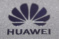 FILE PHOTO: Huawei logo is seen during Munich Auto Show, IAA Mobility 2021 in Munich, Germany, September 8, 2021. REUTERS/Wolfgang Rattay/File Photo