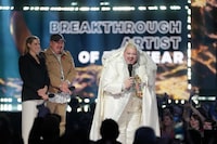 Talk receives his award for breakthrough artist of the year at the Juno awards, in Halifax, Sunday, March 24, 2024. THE CANADIAN PRESS/Darren Calabrese