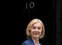 British Prime Minister Liz Truss leaves 10 Downing Street to attend her first Prime Minister's Questions at the Houses of Parliament, in London, Wednesday, Sept. 7, 2022. This was the year war returned to Europe, and few facets of life were left untouched. Russia’s invasion of its neighbor Ukraine unleashed misery on millions of Ukrainians, shattered Europe’s sense of security, ripped up the geopolitical map and rocked the global economy. The shockwaves made life more expensive in homes across Europe, worsened a global migrant crisis and complicated the world’s response to climate change.  (AP Photo/Frank Augstein)