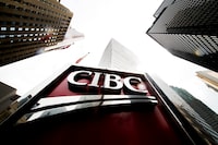 A CIBC sign is shown in the financial district in Toronto on Tuesday, August 22, 2017. THE CANADIAN PRESS/Nathan Denette