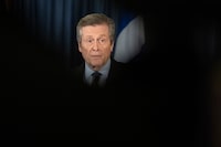 John Tory addresses the media at Toronto city hall on Friday February 17, 2023. Tory began to hand over his mayoral powers at Toronto City Hall on Friday, as he makes a scandal-plagued exit from office.THE CANADIAN PRESS/Chris Young 