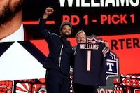 DETROIT, MICHIGAN - APRIL 25: (L-R) Caleb Williams poses with NFL Commissioner Roger Goodell after being selected first overall by the Chicago Bears during the first round of the 2024 NFL Draft at Campus Martius Park and Hart Plaza on April 25, 2024 in Detroit, Michigan. (Photo by Gregory Shamus/Getty Images)