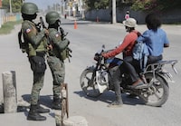 Canada will have an additional evacuation flight out of Haiti next week after a last-minute spike in the number of requests to flee the Caribbean country. Soldiers patrol the road near the international airport in Port-au-Prince, Haiti, Wednesday, March 13, 2024. THE CANADIAN PRESS/AP-Odelyn Joseph