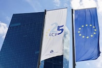 FILE PHOTO: A view shows the European Central Bank (ECB) flag and the flag of the European Union in front of the ECB Building, on the day of the monthly news conference following the ECB's monetary policy meeting in Frankfurt, Germany, September 14, 2023. REUTERS/Wolfgang Rattay/File Photo
