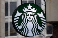 FILE - This Tuesday, March 14, 2017, file photo shows the Starbucks logo on a shop in downtown Pittsburgh. Starbucks reports earnings on Thursday, Nov. 2, 2023.   (AP Photo/Gene J. Puskar, File)