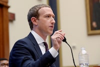 FILE PHOTO: Facebook Chairman and CEO Mark Zuckerberg testifies at a House Financial Services Committee hearing in Washington, U.S., October 23, 2019. REUTERS/Erin Scott/File Photo